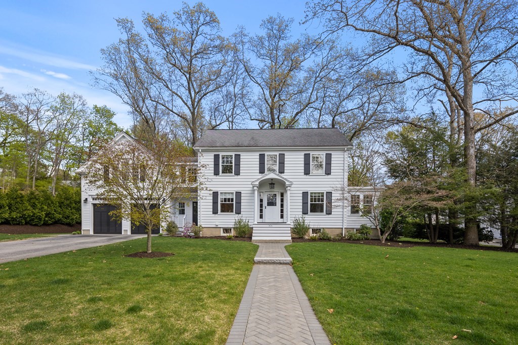 43 Bertwell Road Lexington, MA 02420 - Photo 2 of 41 a front view of a house with a garden and trees