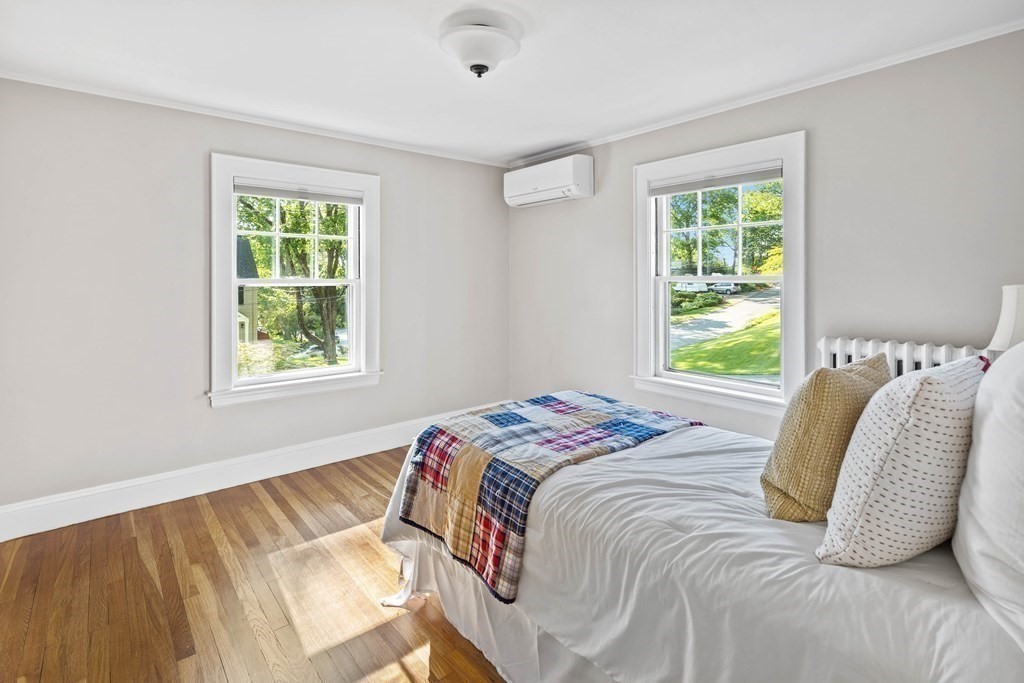 43 Bertwell Road Lexington, MA 02420 - Photo 21 of 41 a bedroom with a bed and next to a window