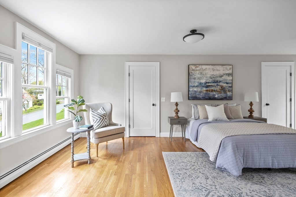 43 Bertwell Road Lexington, MA 02420 - Photo 23 of 41 a bedroom with a bed and a large window