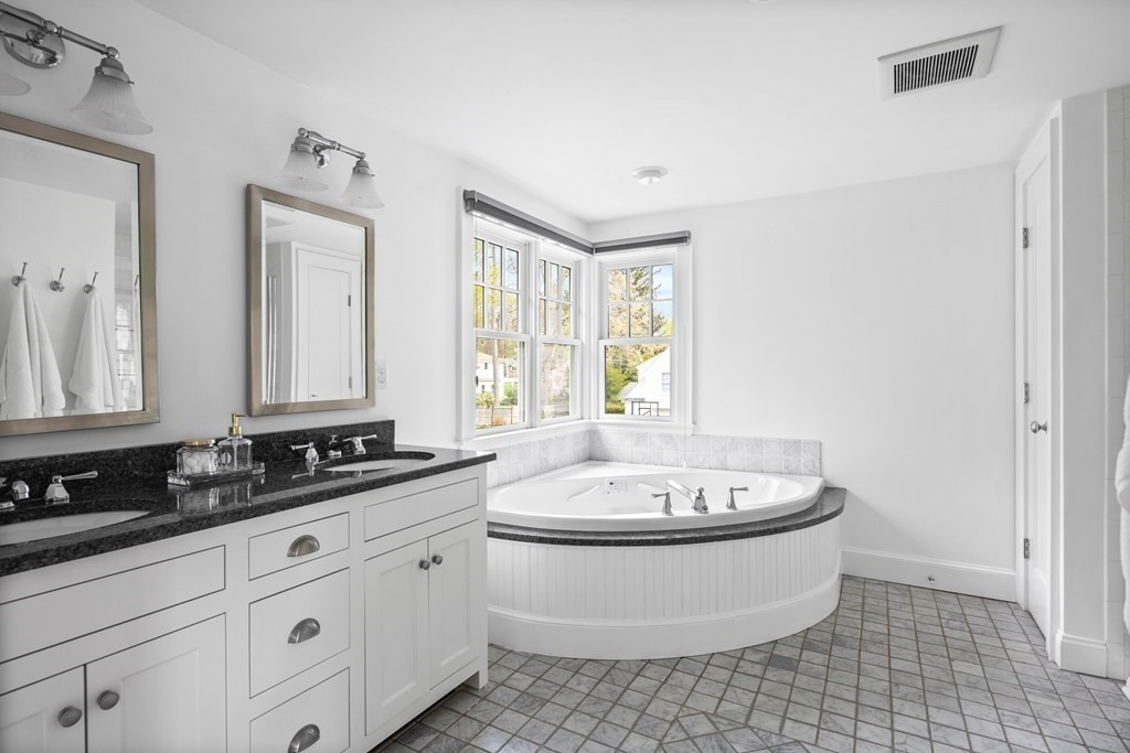 43 Bertwell Road Lexington, MA 02420 - Photo 27 of 41 a bathroom with a sink and a mirror