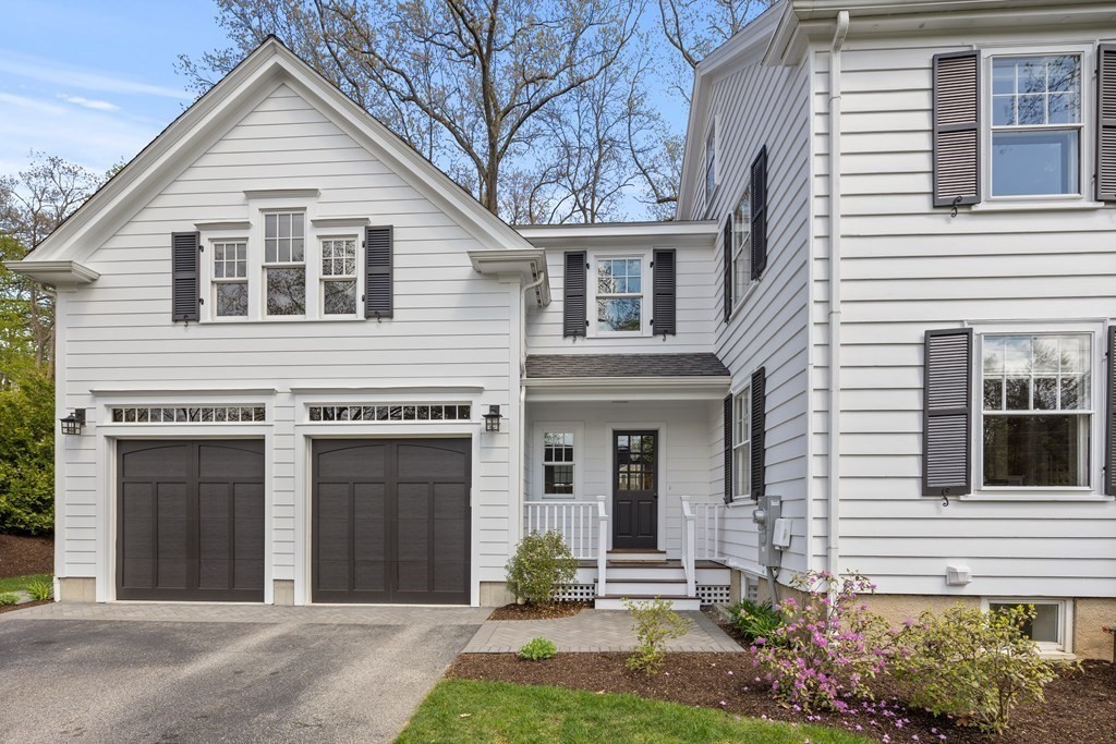 43 Bertwell Road Lexington, MA 02420 - Photo 3 of 41 a view of a white house next to a yard