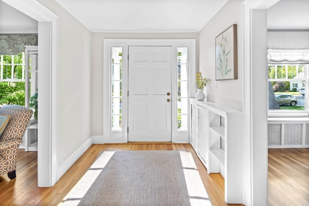 43 Bertwell Road Lexington, MA 02420 - Photo 4 of 41 a view of a hallway with white walls and windows