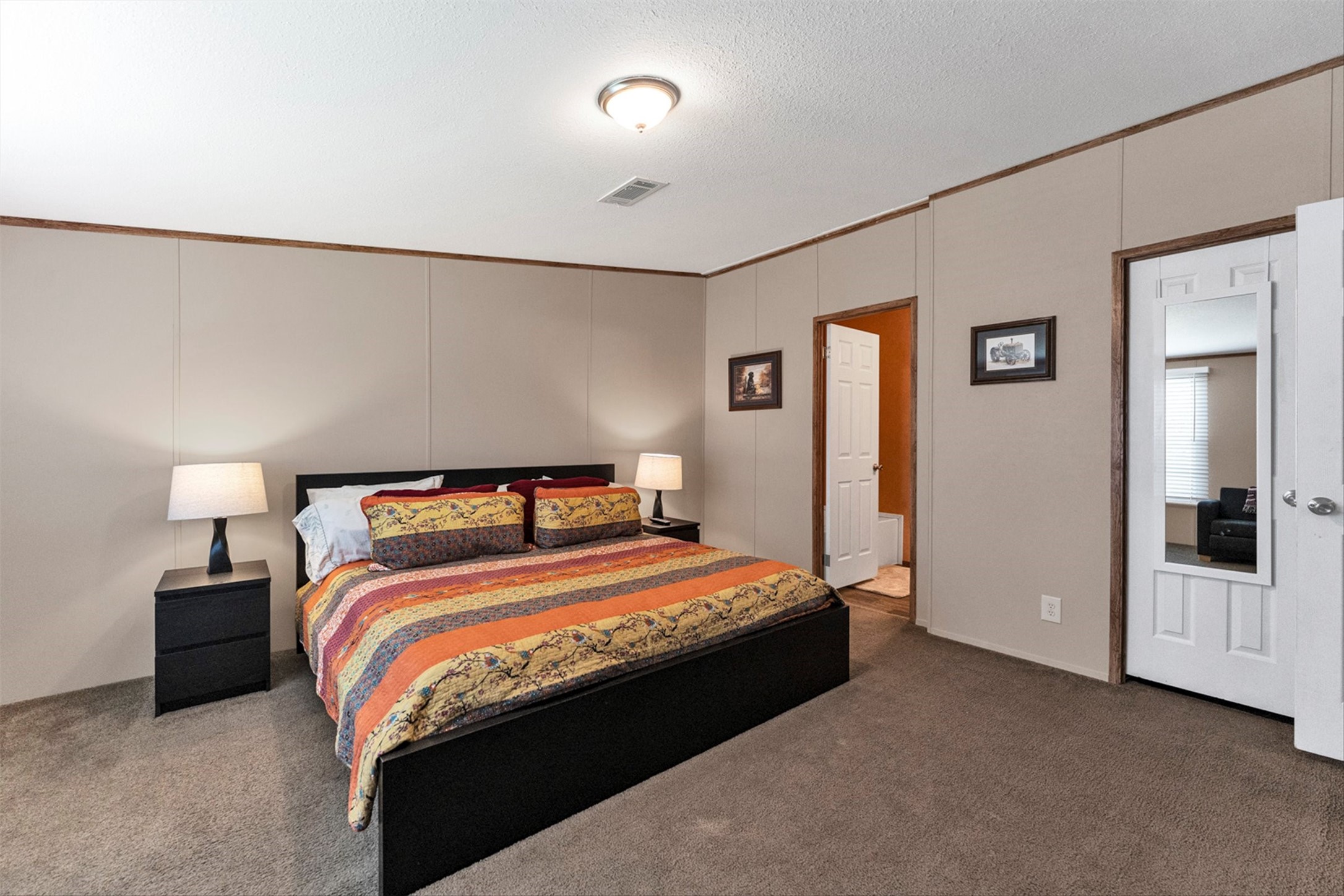 50 Fm 3179 Road Huntsville, TX 77320 - Photo 25 of 45 Private bedroom with en suite bathroom offers comfort and convenience for guests or family.