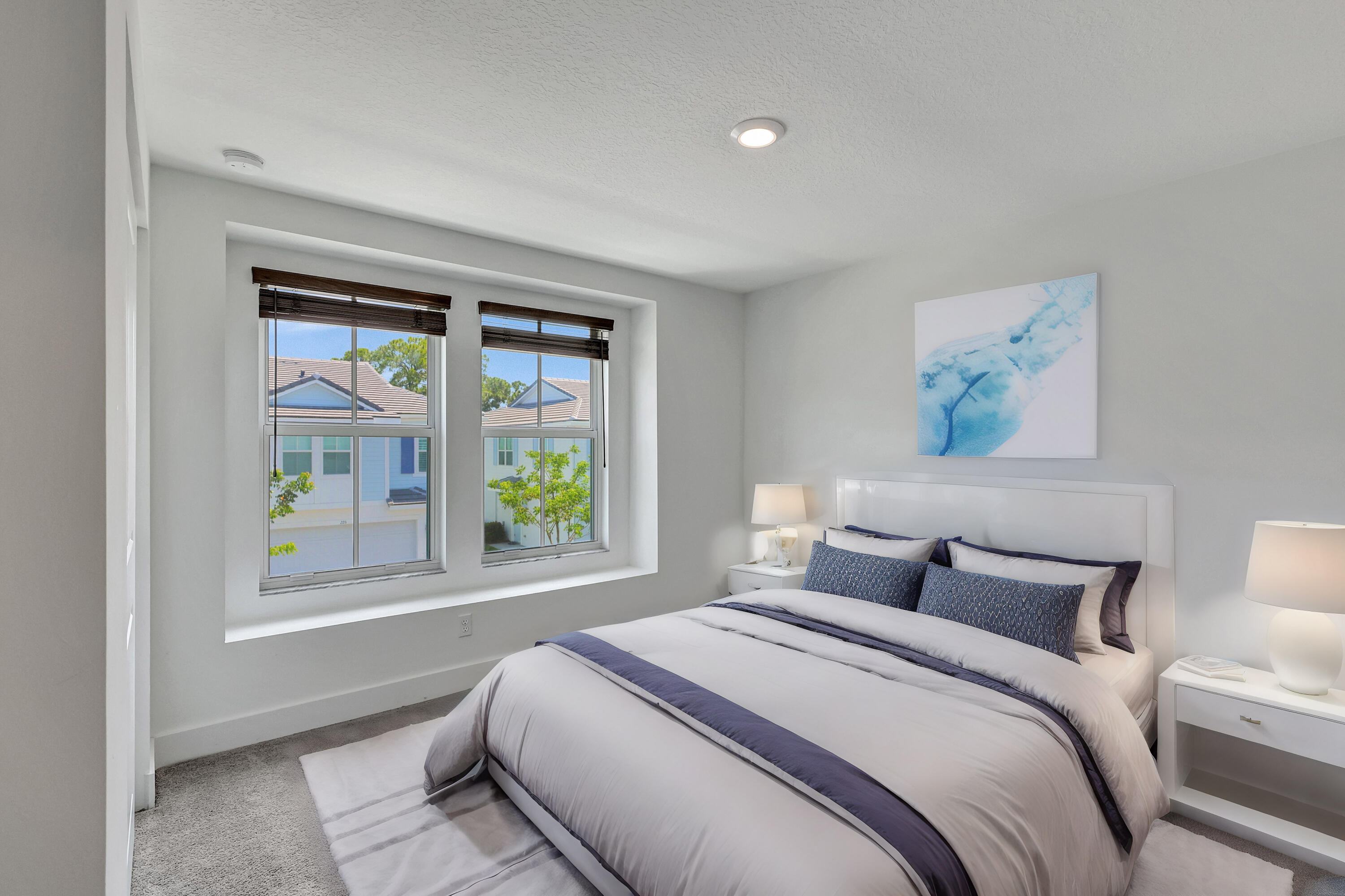 229 Preserve Trail South Stuart, FL 34994 - Photo 11 of 60 a bedroom with a bed and a large window