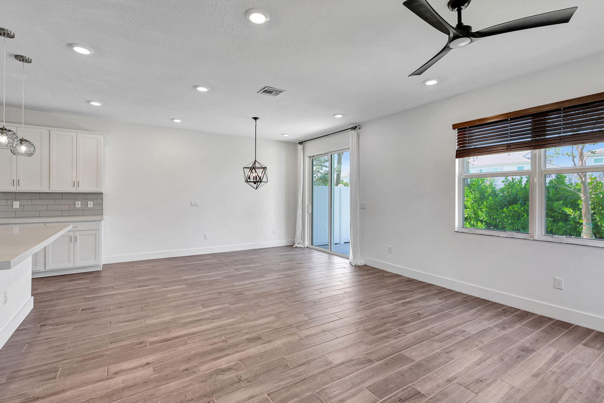 229 Preserve Trail South Stuart, FL 34994 - Photo 25 of 60 a view of an empty room with wooden floor and a window