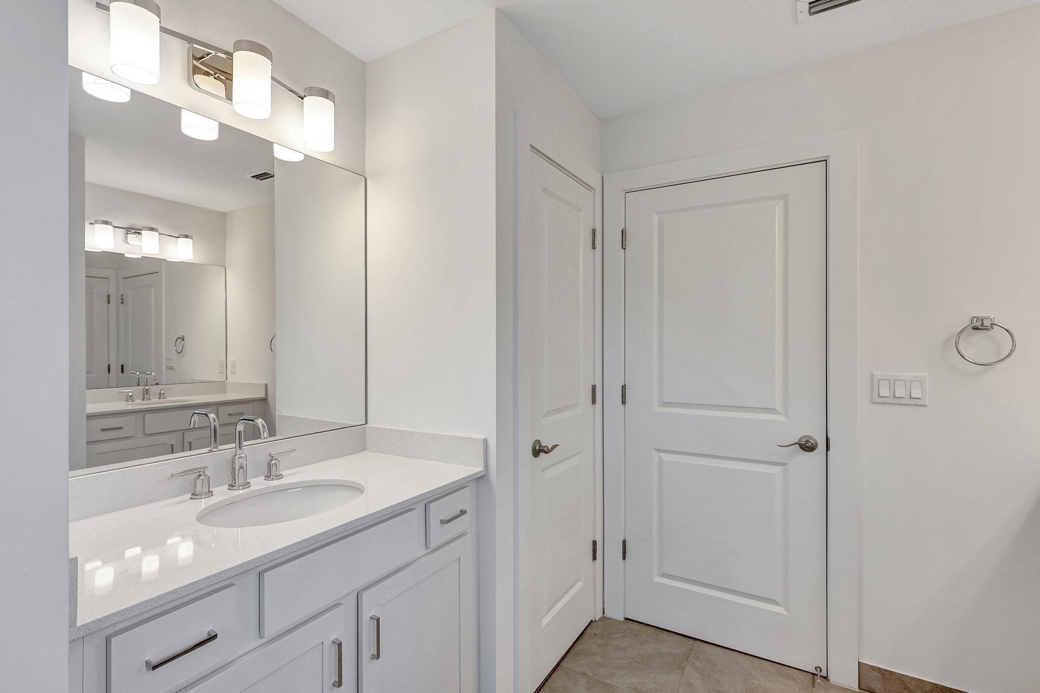 229 Preserve Trail South Stuart, FL 34994 - Photo 35 of 60 a bathroom with a granite countertop sink two mirror and a shower
