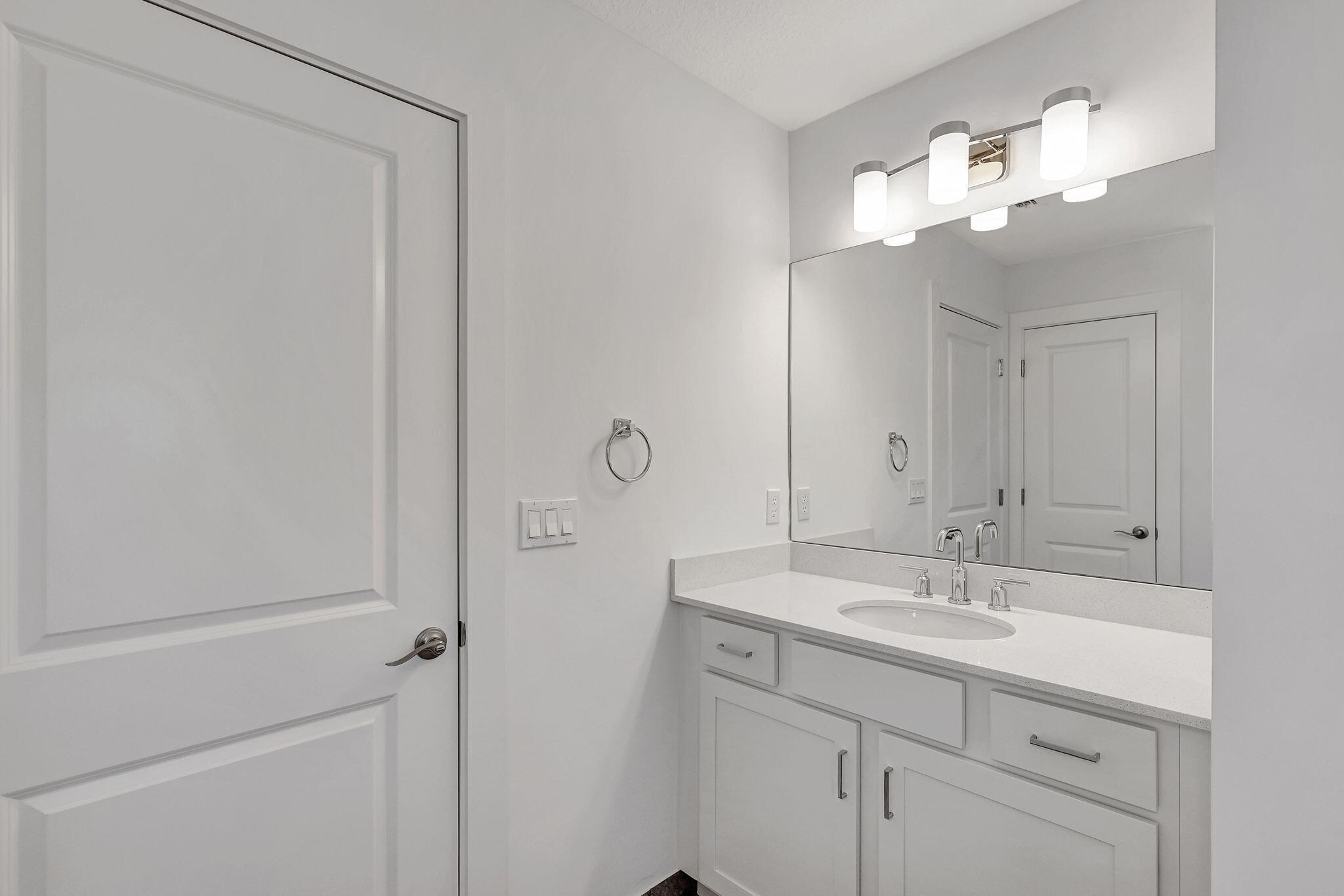 229 Preserve Trail South Stuart, FL 34994 - Photo 36 of 60 a bathroom with a sink vanity and a mirror