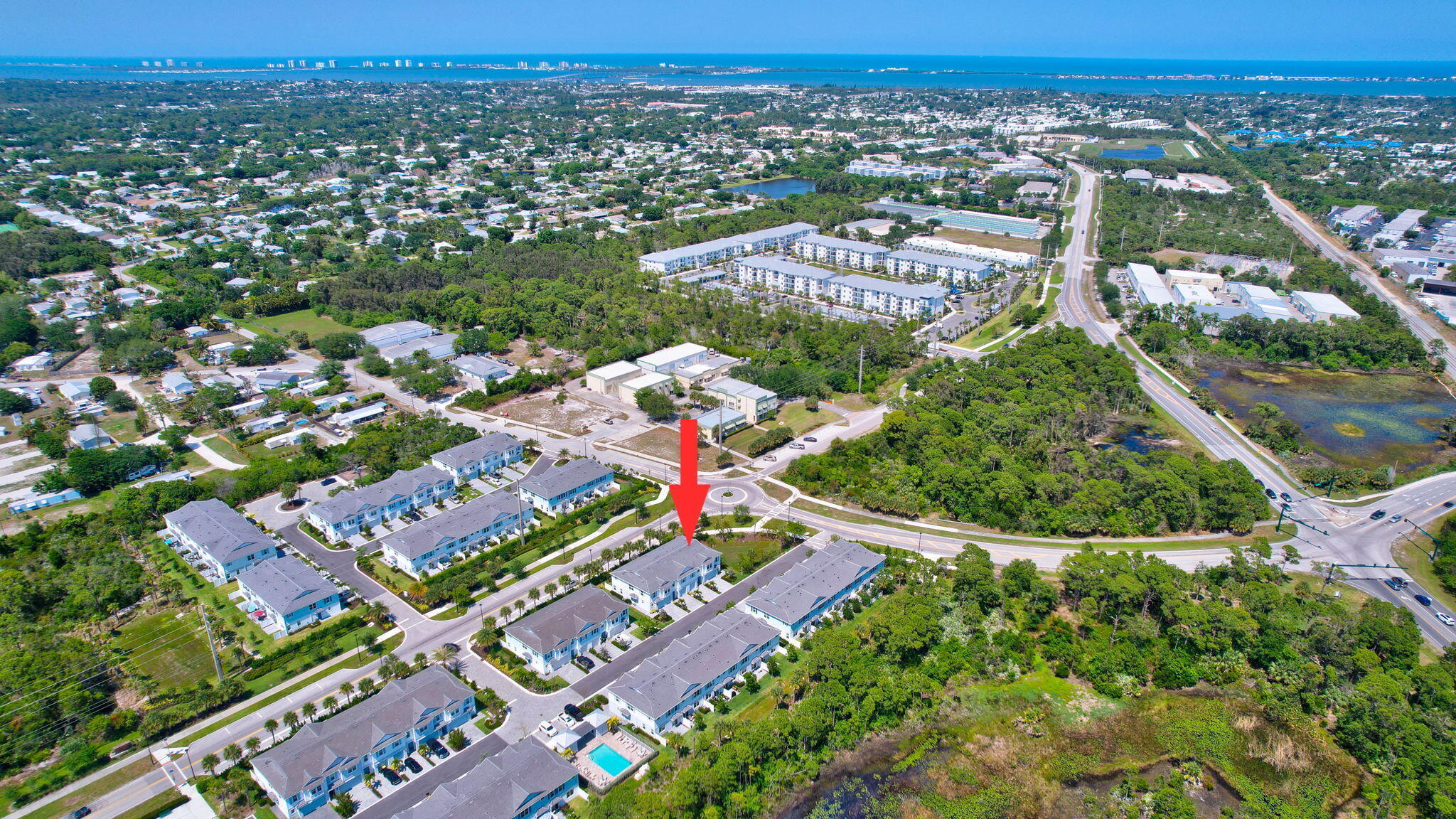 229 Preserve Trail South Stuart, FL 34994 - Photo 53 of 60 an aerial view of residential houses with outdoor space and trees