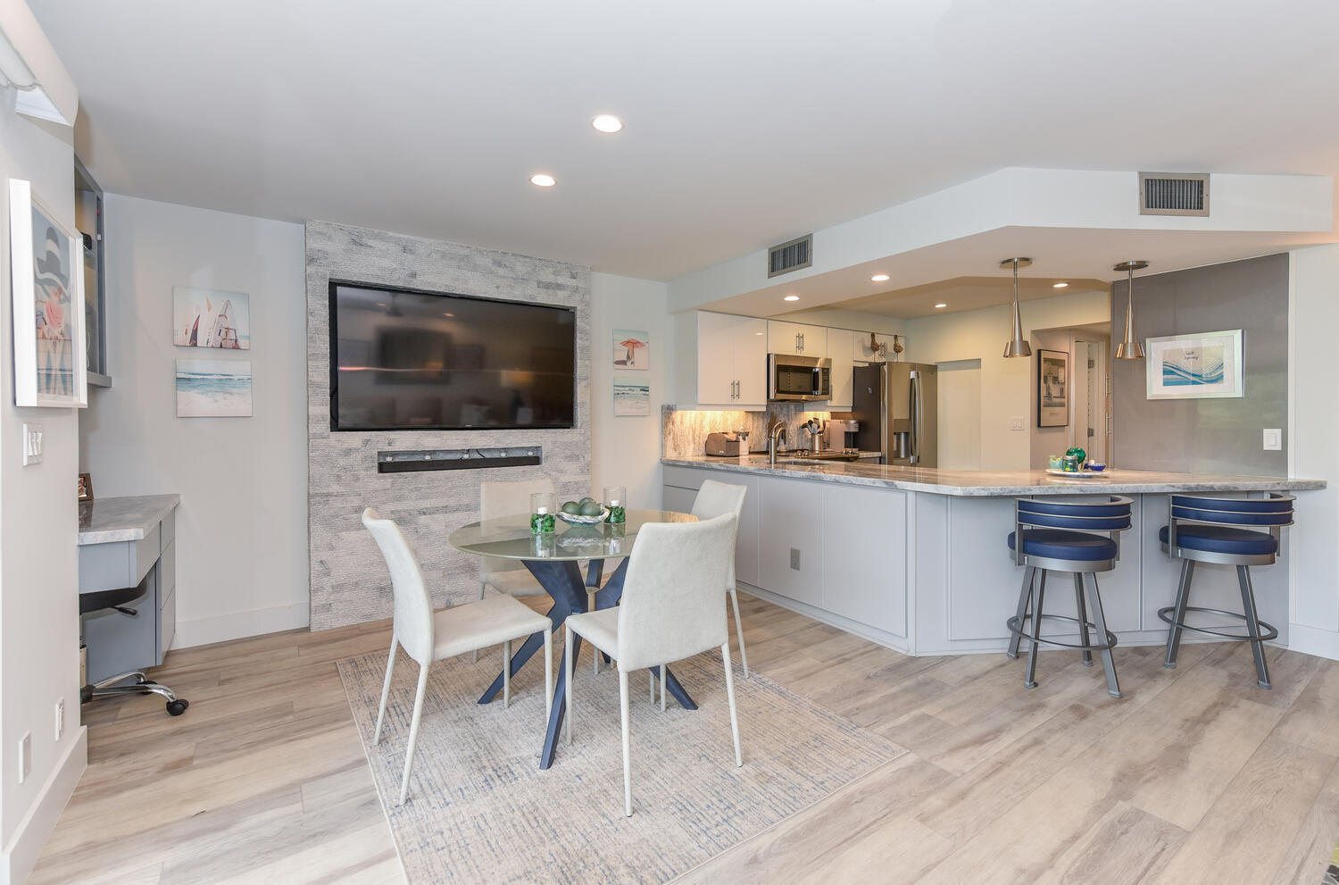 1605 Highway 1, Unit B302 Jupiter, FL 33477 - Photo 13 of 47 a view of a dining room with furniture and wooden floor