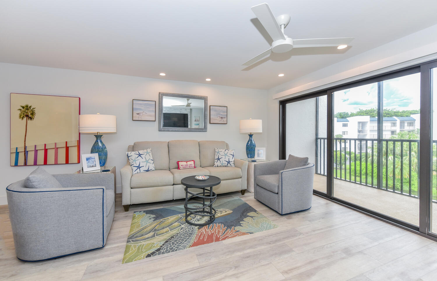 1605 Highway 1, Unit B302 Jupiter, FL 33477 - Photo 20 of 47 a living room with furniture and a flat screen tv
