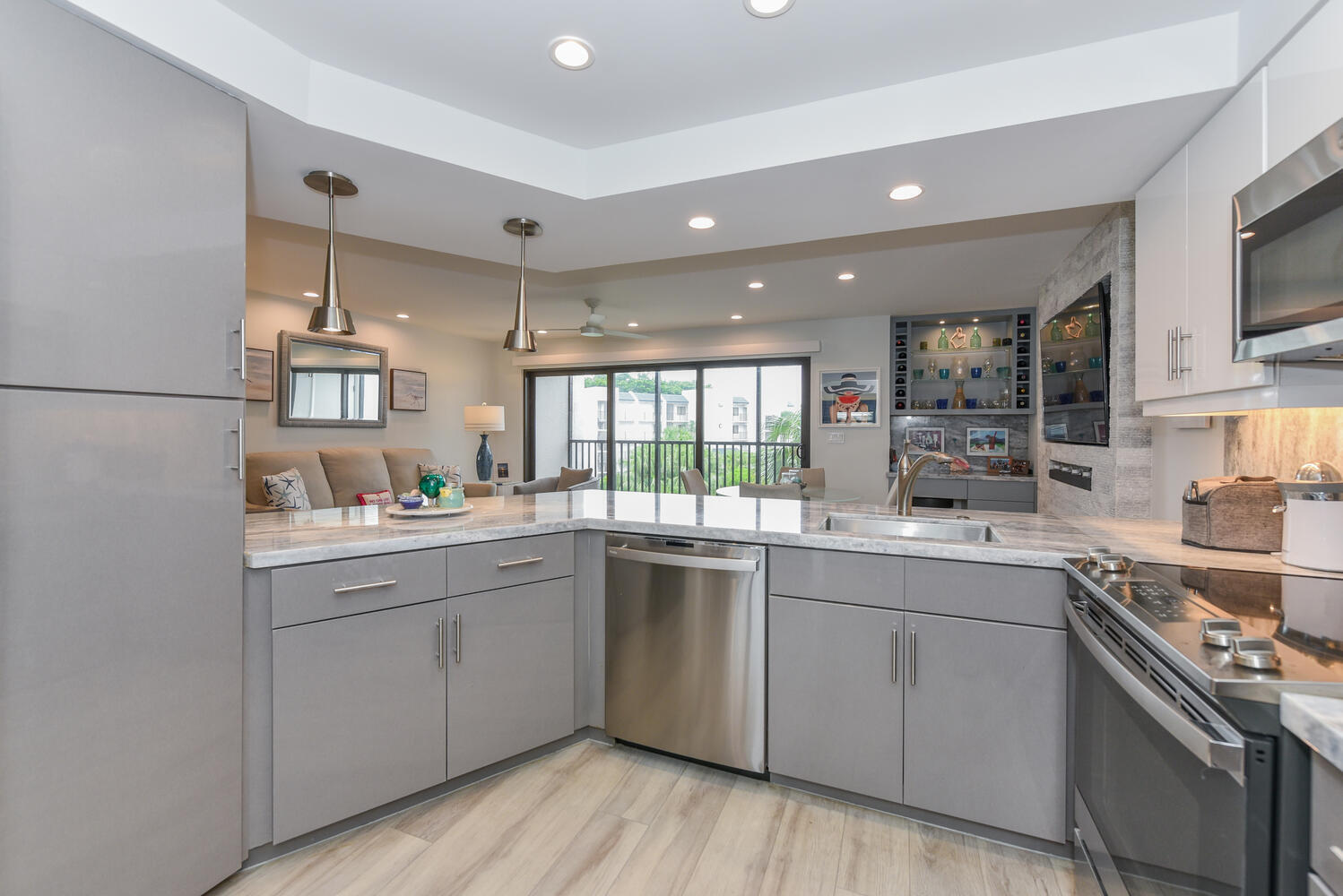 1605 Highway 1, Unit B302 Jupiter, FL 33477 - Photo 27 of 47 a kitchen with a sink cabinets and window