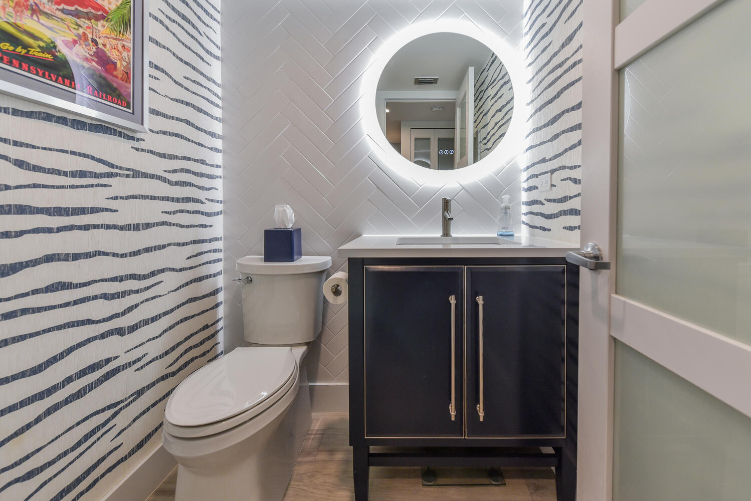 1605 Highway 1, Unit B302 Jupiter, FL 33477 - Photo 31 of 47 a bathroom with a toilet and a sink