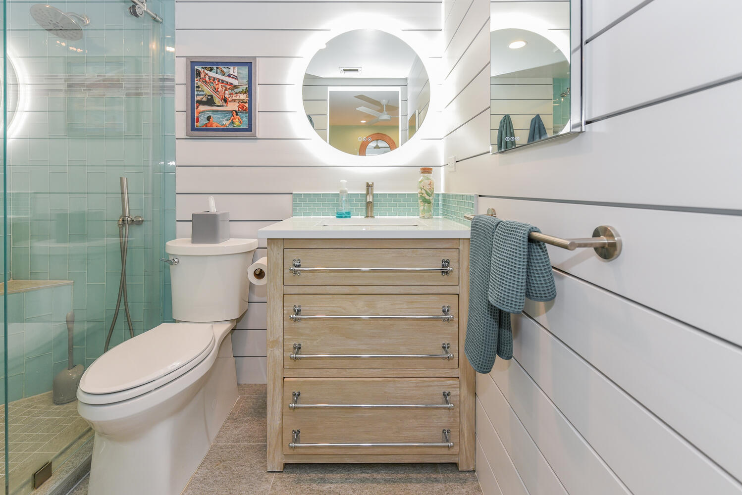 1605 Highway 1, Unit B302 Jupiter, FL 33477 - Photo 34 of 47 a bathroom with a toilet a sink and mirror