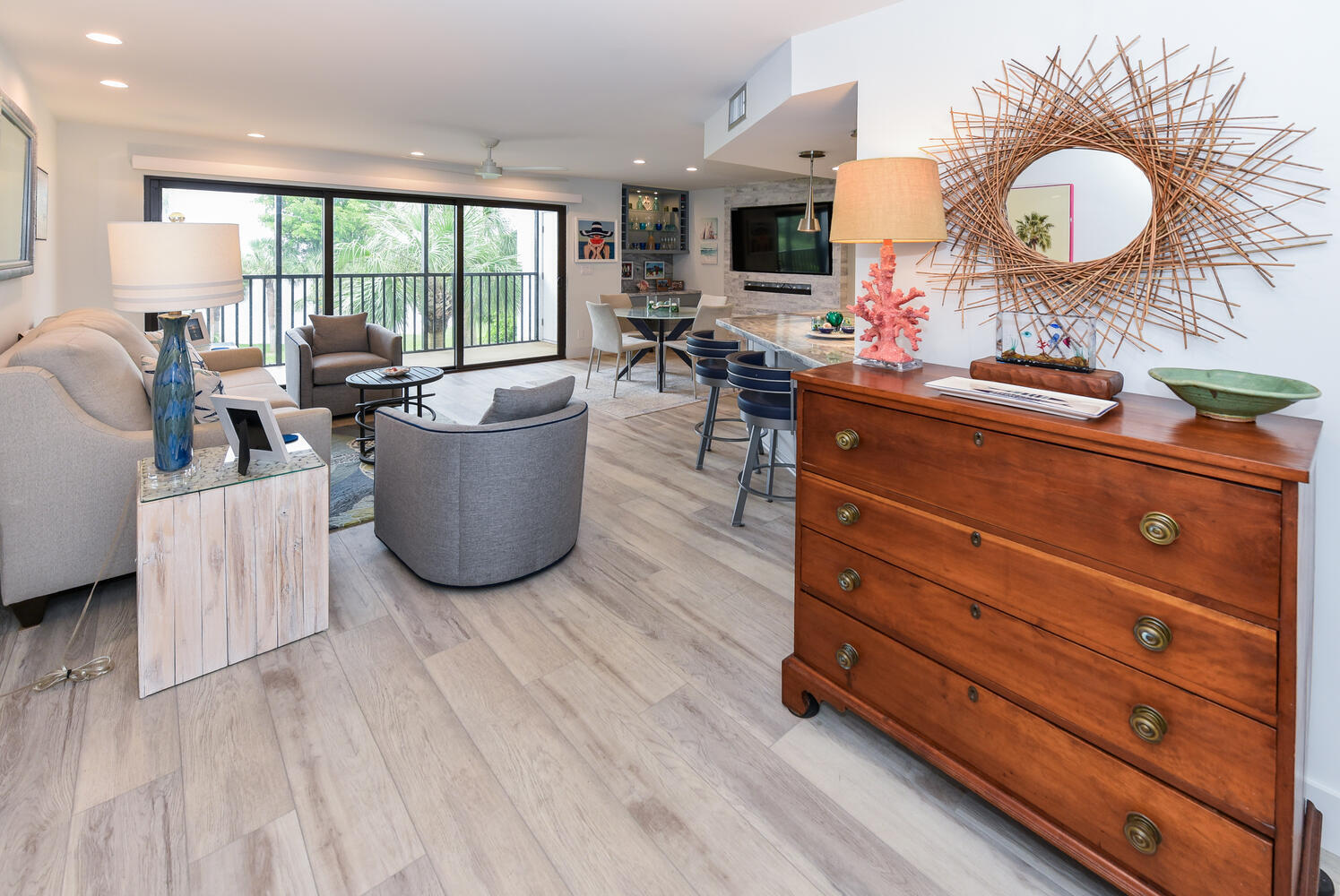 1605 Highway 1, Unit B302 Jupiter, FL 33477 - Photo 6 of 47 a living room with a couch and a large window