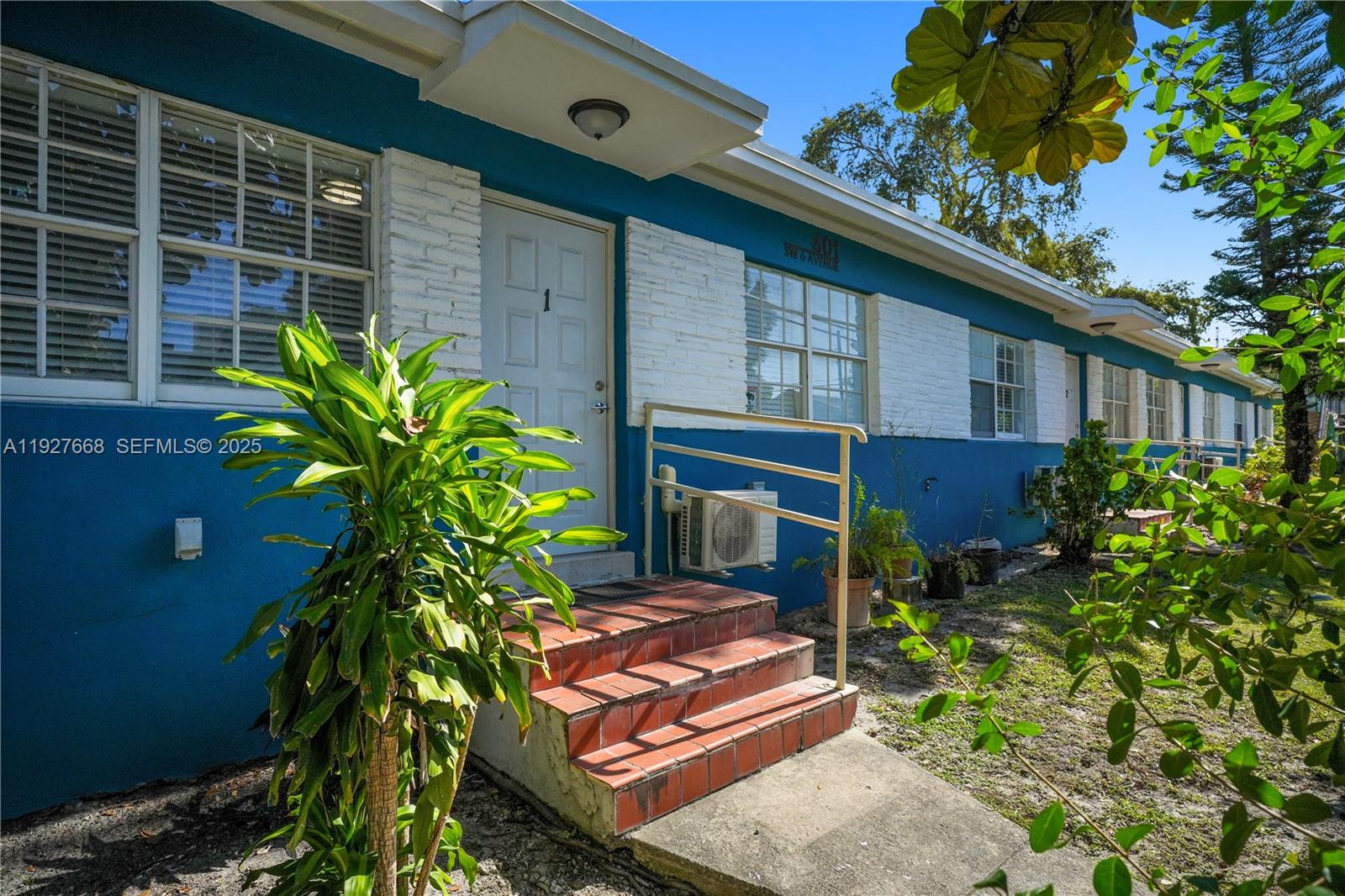 a house with a flower garden