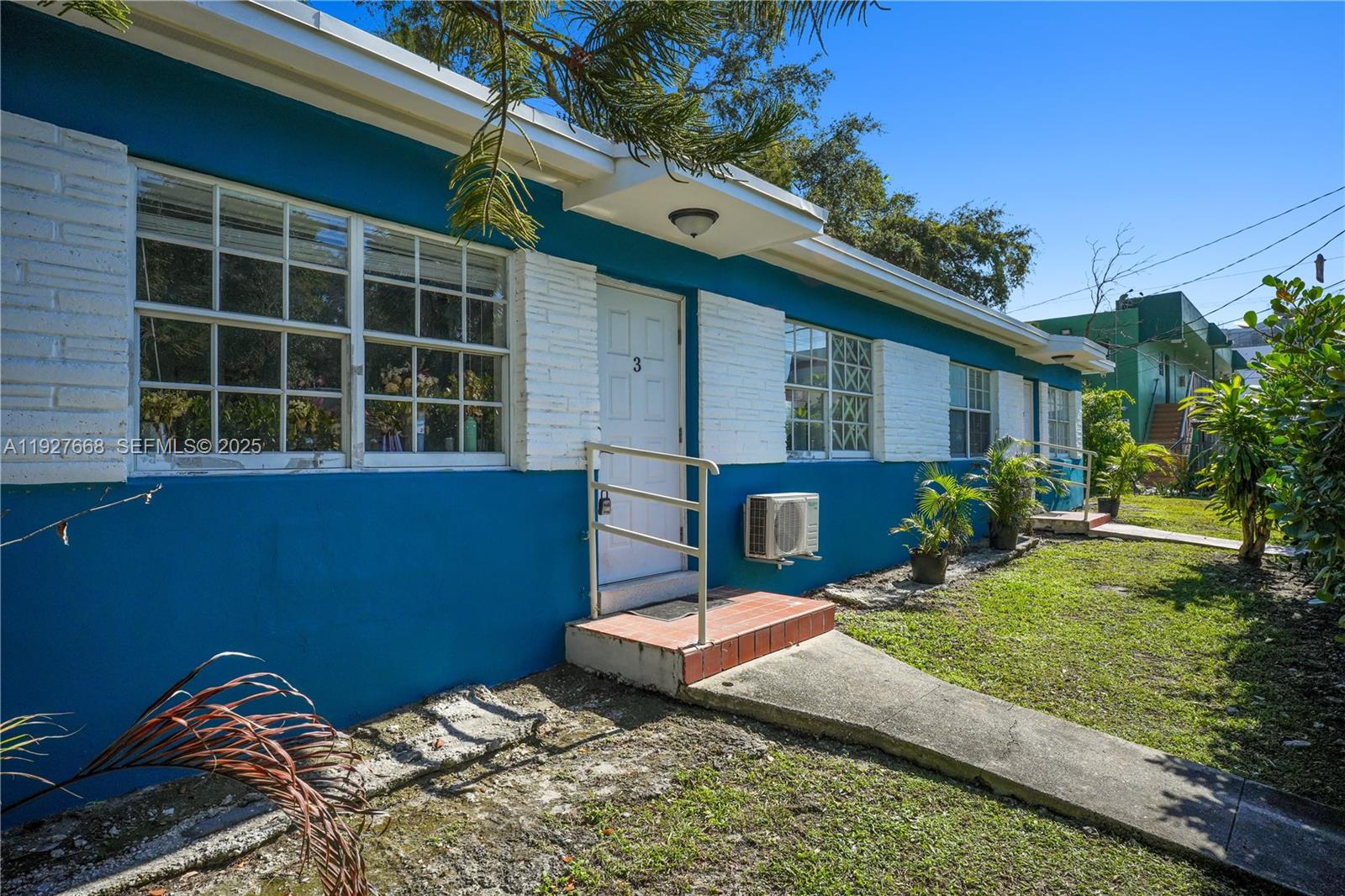 601 Southwest 6th Avenue Miami, FL 33130 - Photo 13 of 20 a view of a backyard with plants and a barbeque