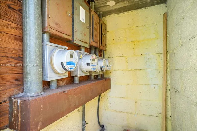 a bathroom with a mirror and shower