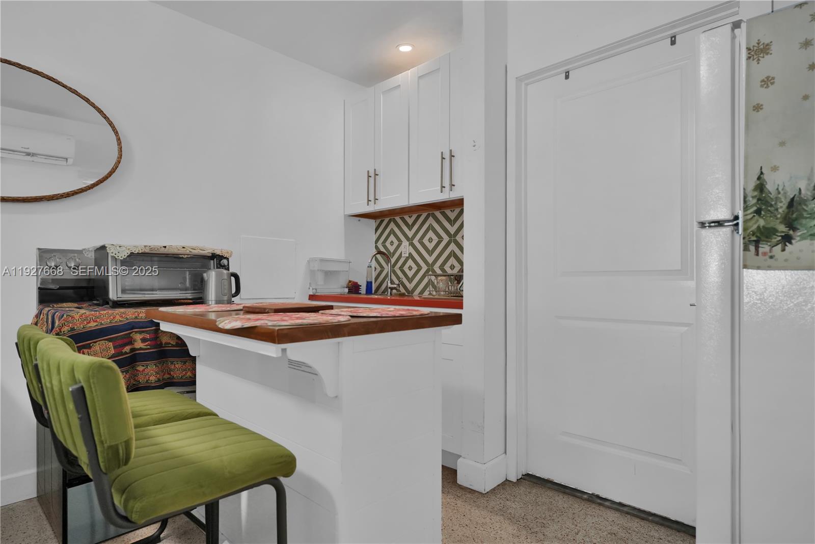 601 Southwest 6th Avenue Miami, FL 33130 - Photo 7 of 20 a kitchen with stainless steel appliances granite countertop a stove and a refrigerator