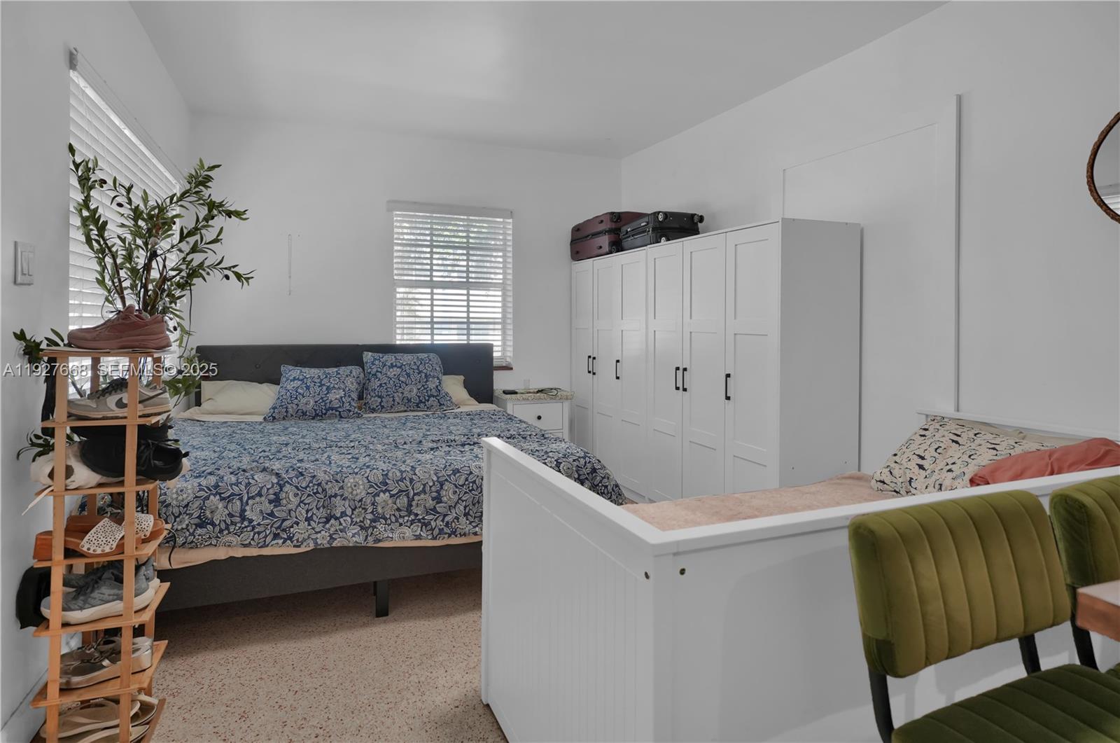 601 Southwest 6th Avenue Miami, FL 33130 - Photo 8 of 20 a bedroom with a bed and a window