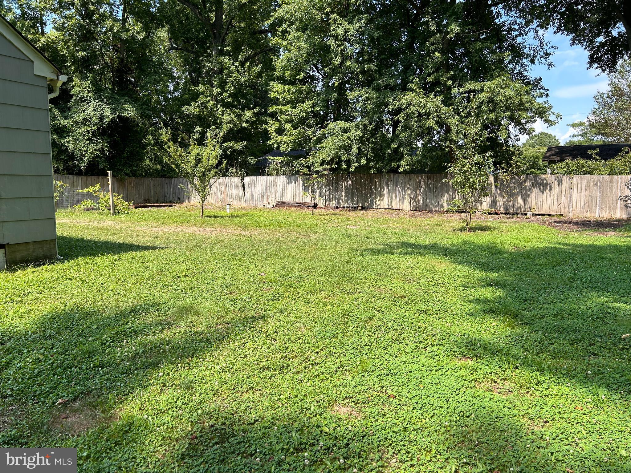 118 Fischer Road Grasonville, MD 21638 - Photo 26 of 37 Back Yard - Space for Garden