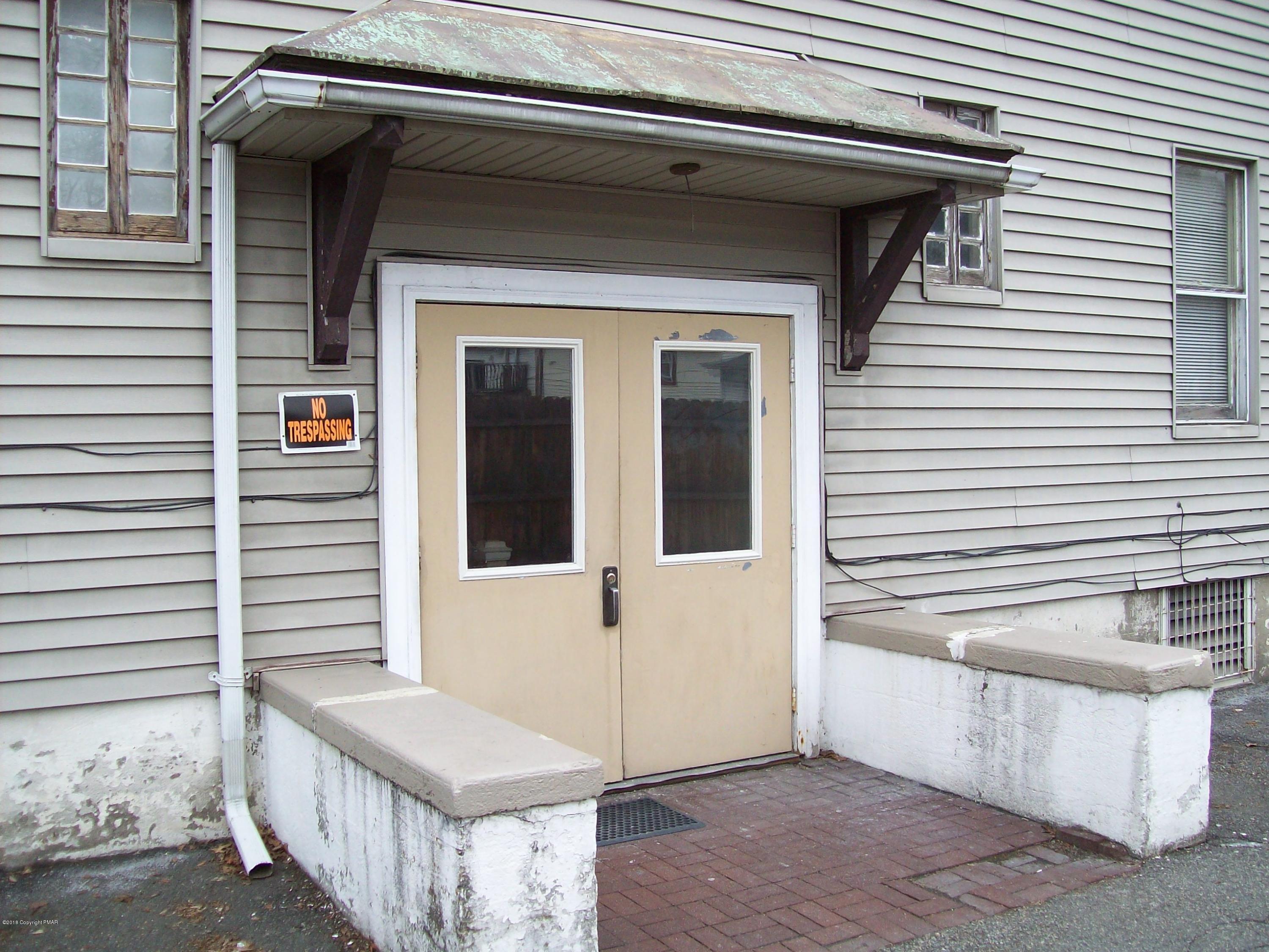 519 Sarah Street, Unit # 11 Stroudsburg, PA 18360 - Photo 2 of 8 a view of a porch with a door and a window