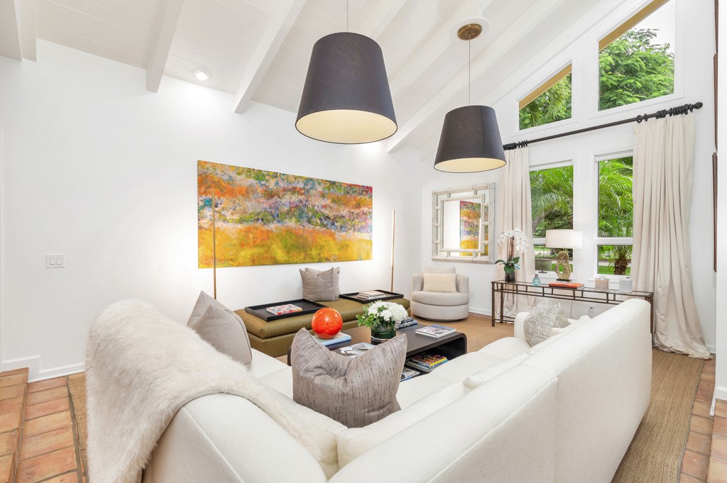1513 East Camino Del Rio Vero Beach, FL 32963 - Photo 2 of 36 a living room with furniture and a large window