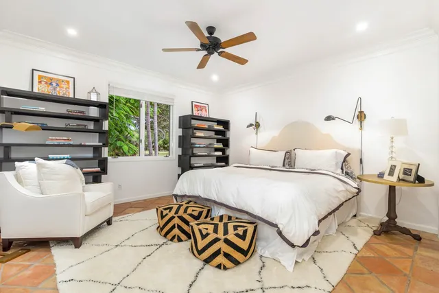 a bed room with a bed and a couch