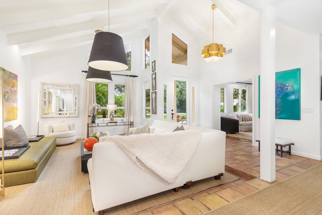 1513 East Camino Del Rio Vero Beach, FL 32963 - Photo 3 of 36 a living room with furniture and a large window