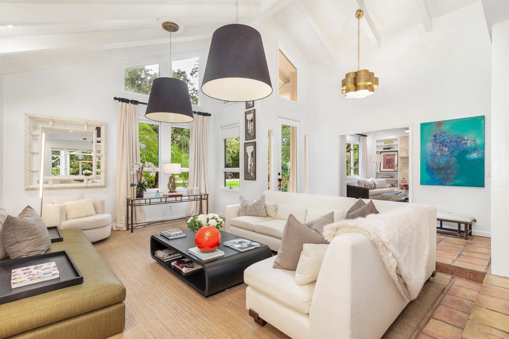 1513 East Camino Del Rio Vero Beach, FL 32963 - Photo 4 of 36 a living room with furniture and a large window