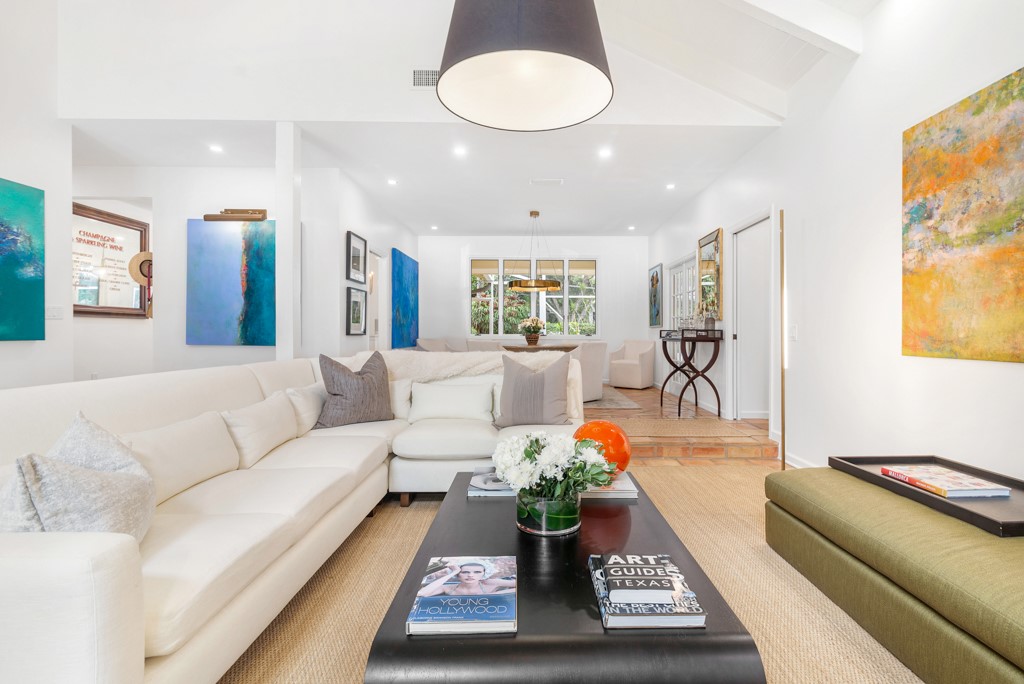 1513 East Camino Del Rio Vero Beach, FL 32963 - Photo 6 of 36 a living room with furniture and a large window