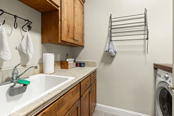a view of a kitchen sink and dishwasher