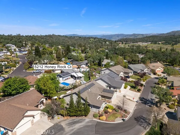 an aerial view of a city with lots of residential buildings