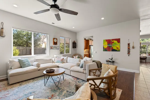 a living room with furniture and a large window