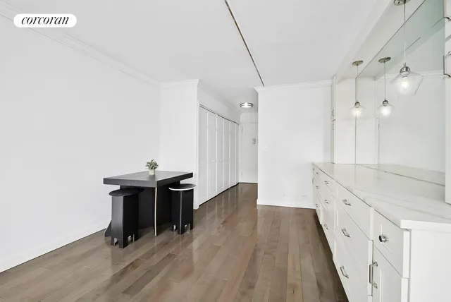 a kitchen with stainless steel appliances granite countertop a sink and a stove top oven