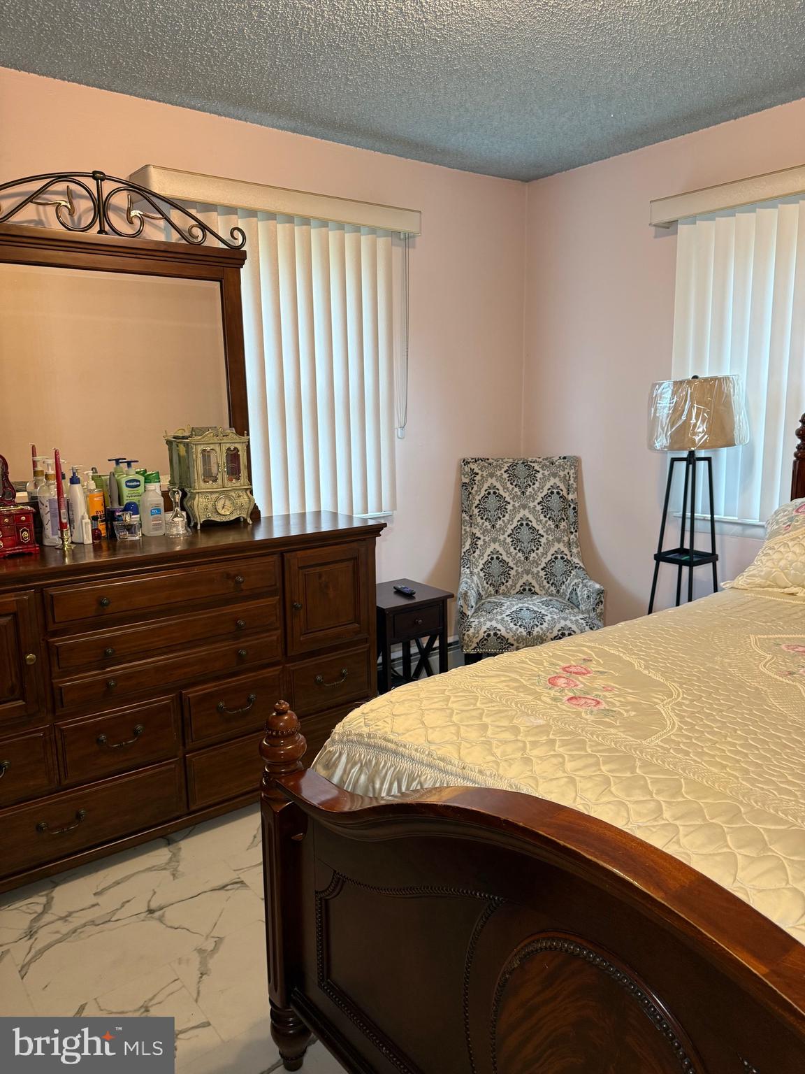 1339 Monmouth Road Mount Holly, NJ 08060 - Photo 14 of 34 a bedroom with a bed and a dresser