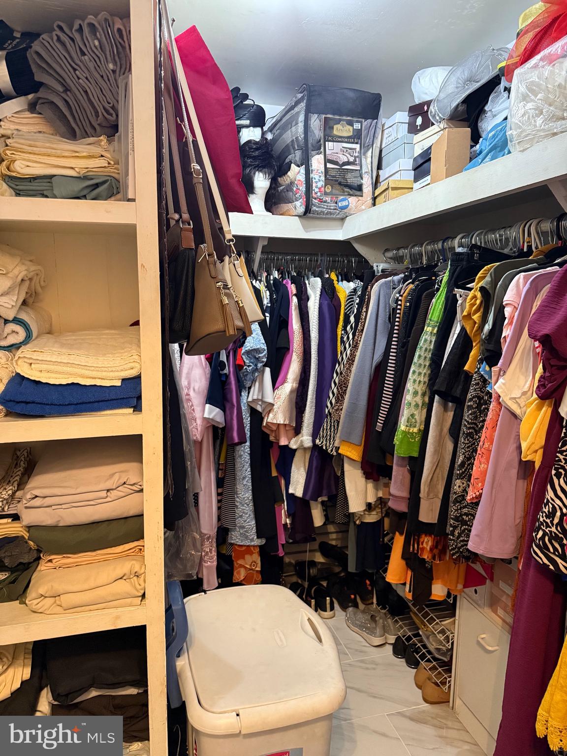1339 Monmouth Road Mount Holly, NJ 08060 - Photo 16 of 34 a view of walk in closet with clothes and shoes