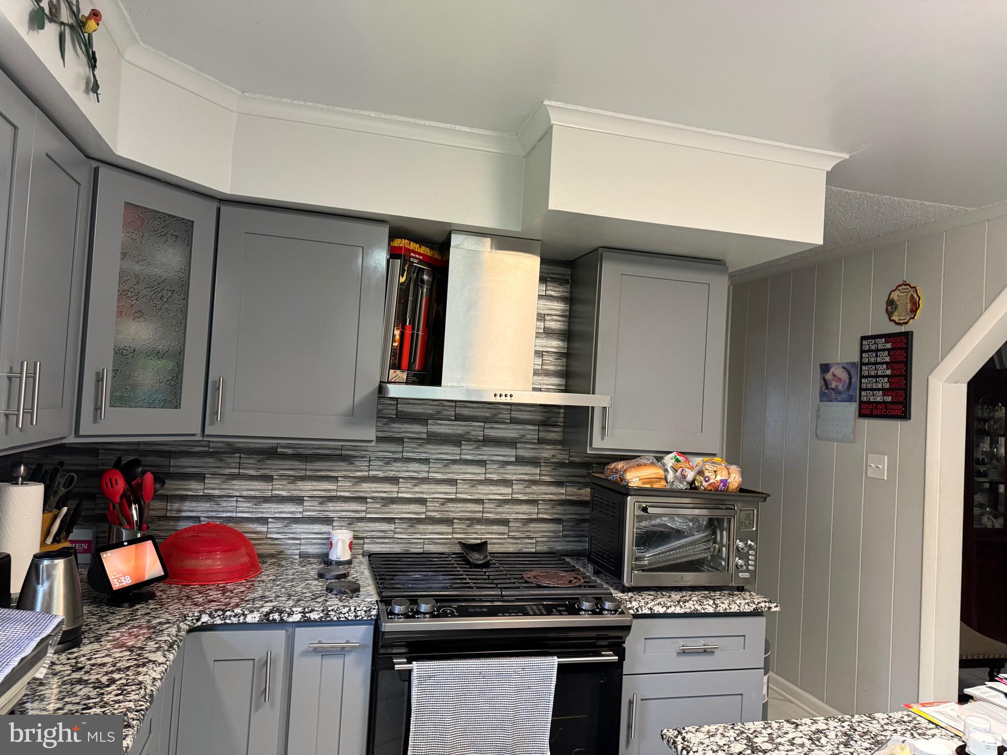 1339 Monmouth Road Mount Holly, NJ 08060 - Photo 21 of 34 a kitchen with stainless steel appliances granite countertop a stove and a sink