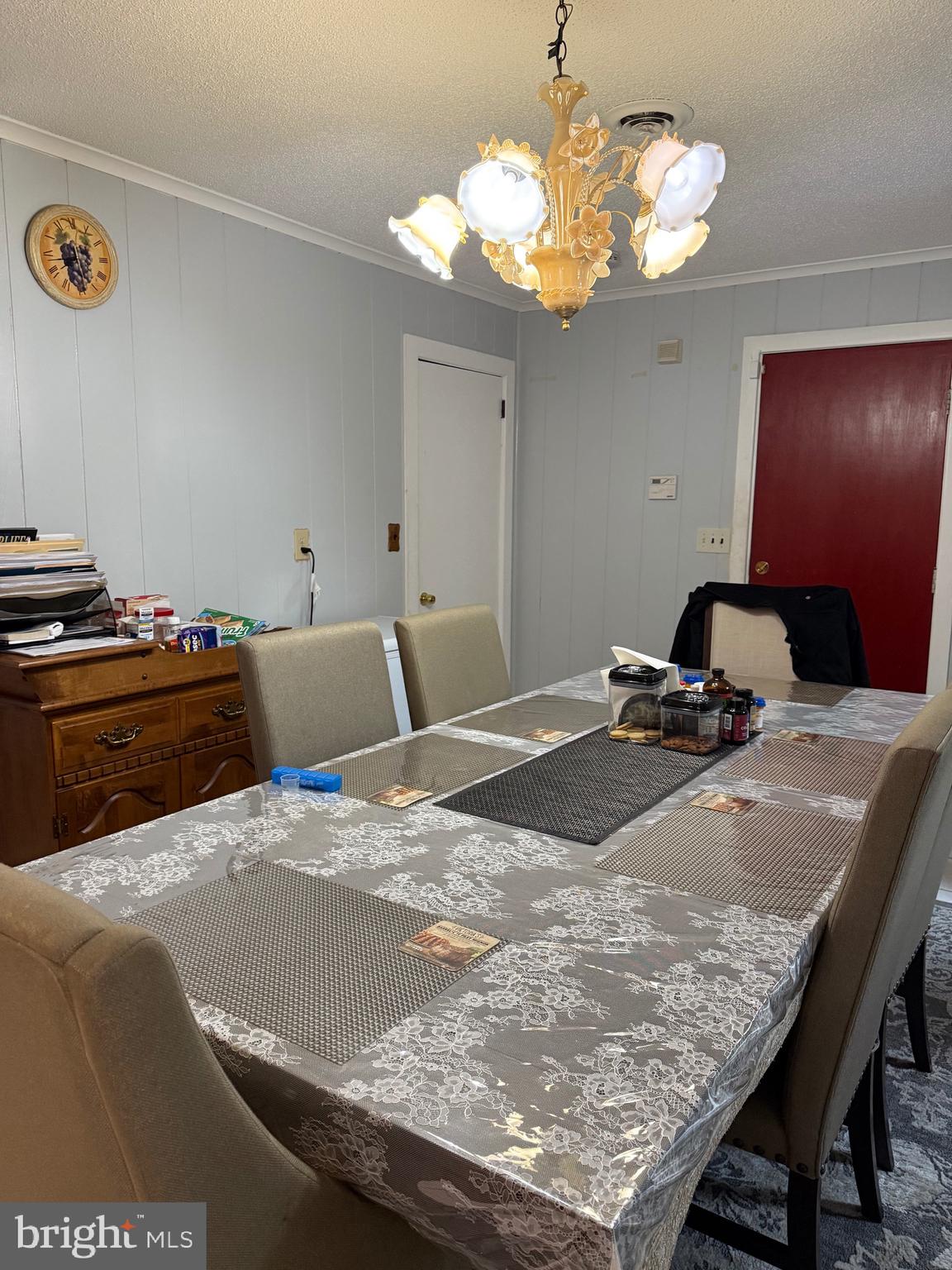 1339 Monmouth Road Mount Holly, NJ 08060 - Photo 25 of 34 a bedroom with a bed and a chandelier