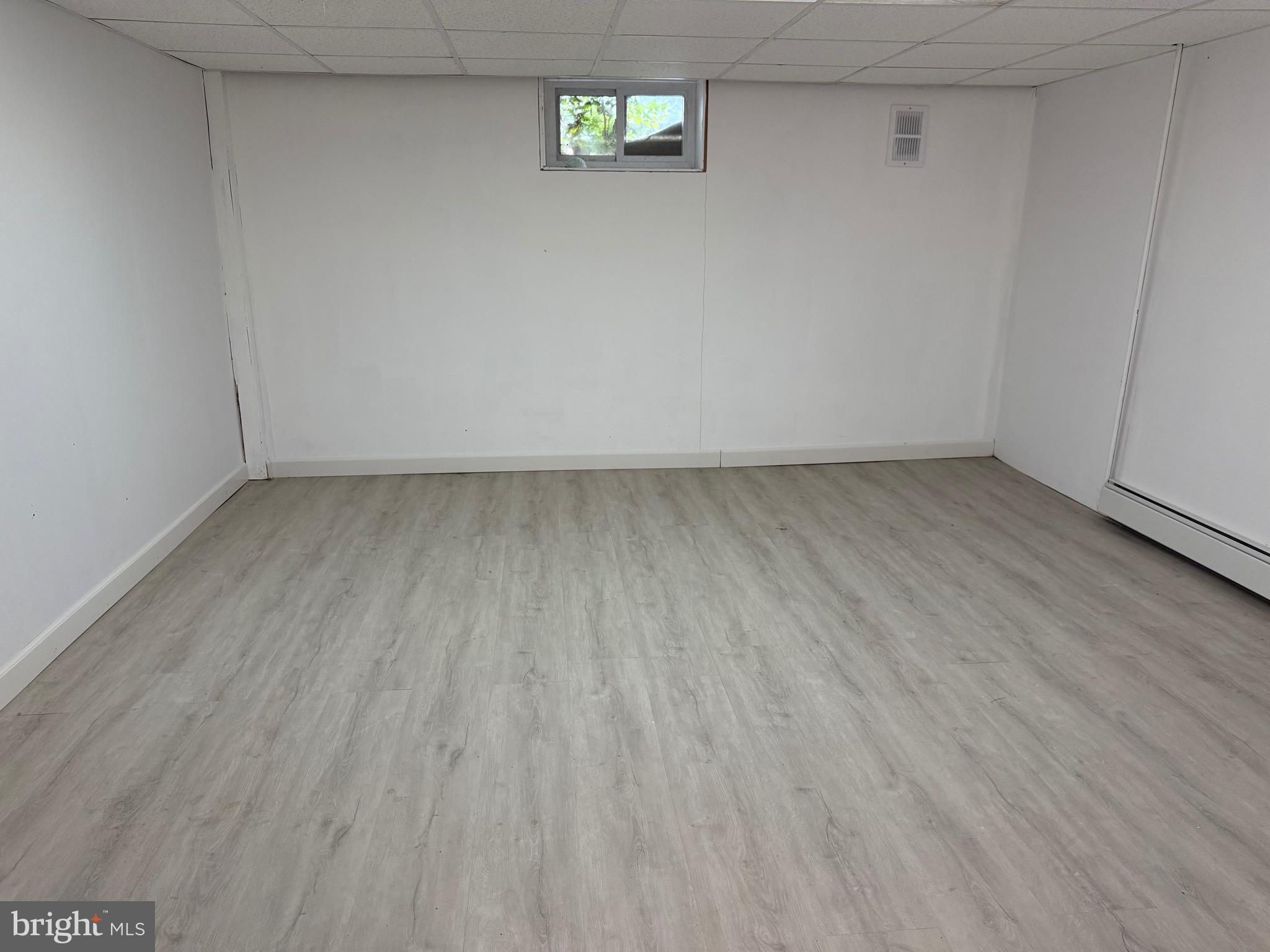 1339 Monmouth Road Mount Holly, NJ 08060 - Photo 29 of 34 a view of an empty room and wooden floor