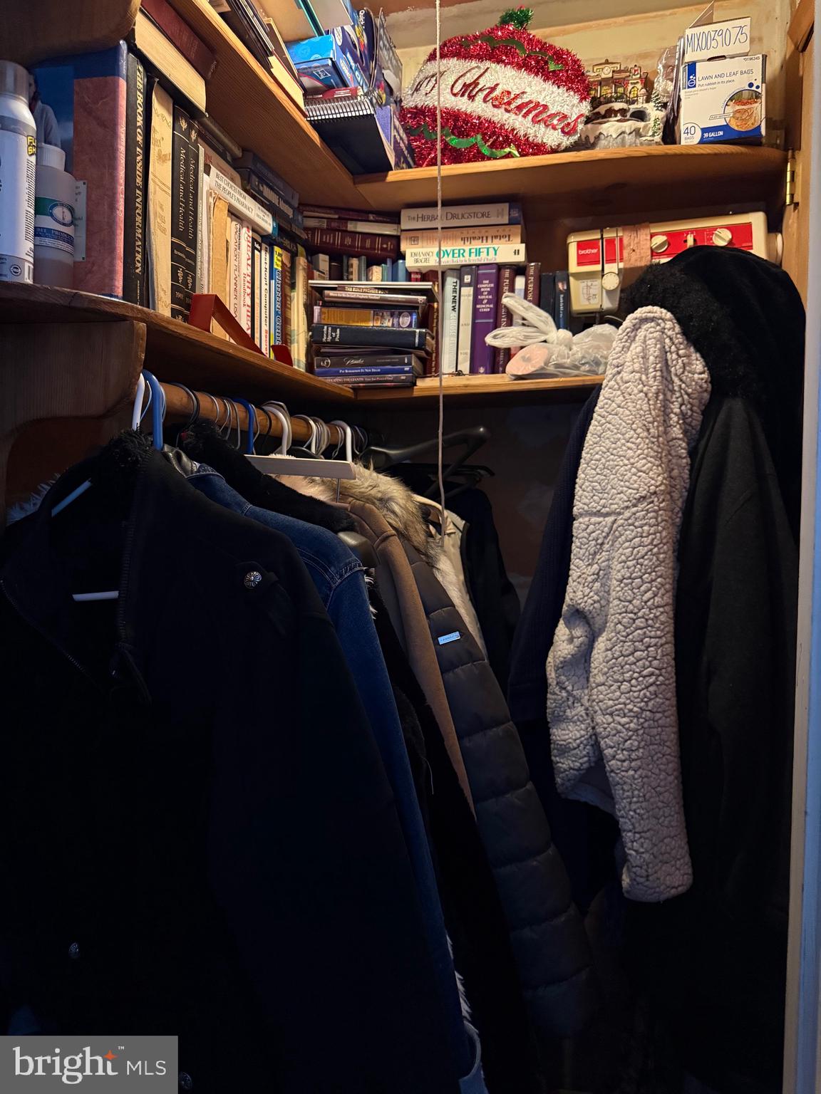 1339 Monmouth Road Mount Holly, NJ 08060 - Photo 33 of 34 a view of walk in closet with clothes and shoes