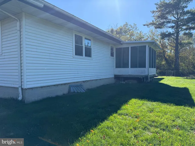a view of a backyard with a garden