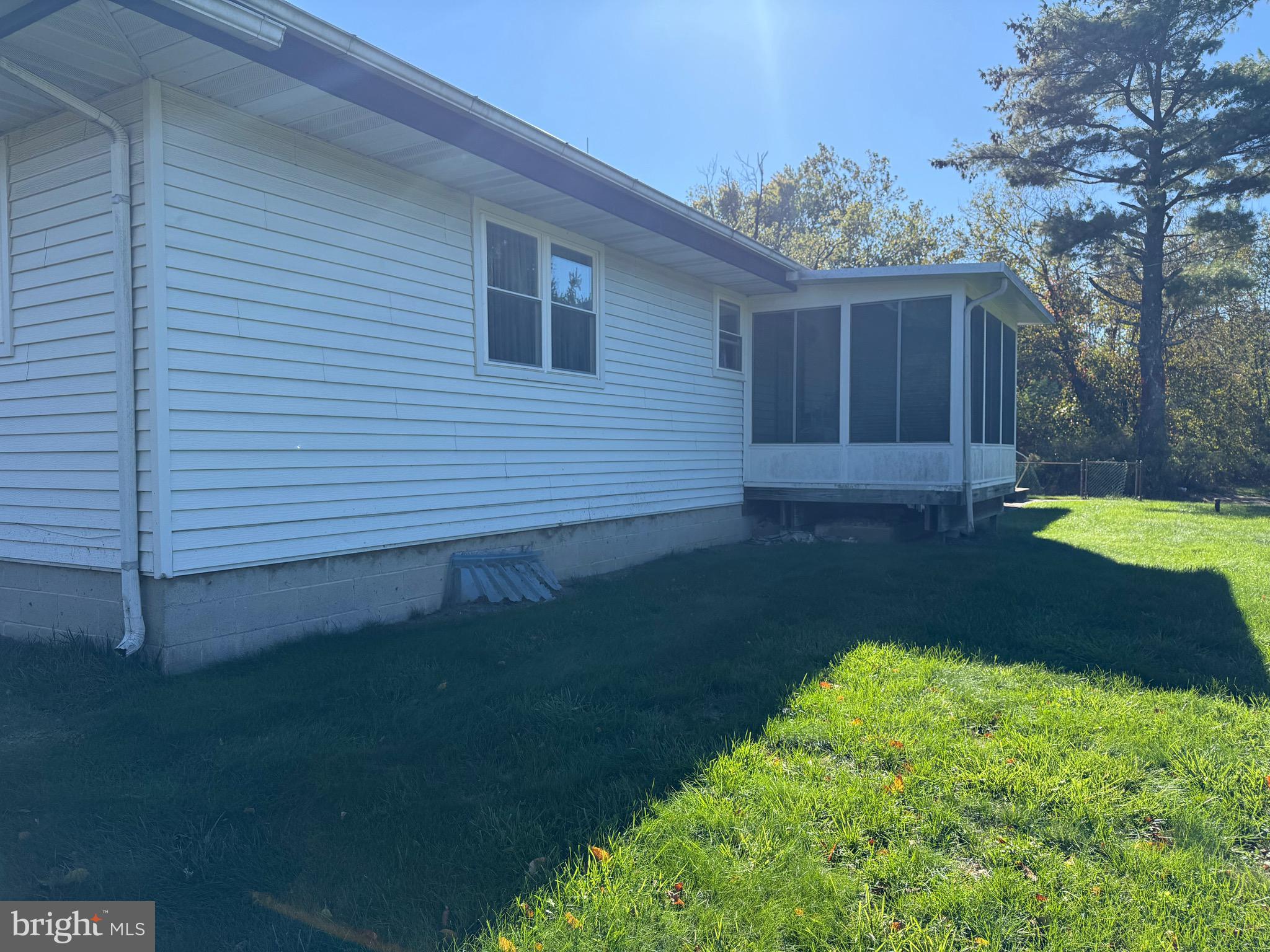 1339 Monmouth Road Mount Holly, NJ 08060 - Photo 6 of 34 a view of a backyard with a garden