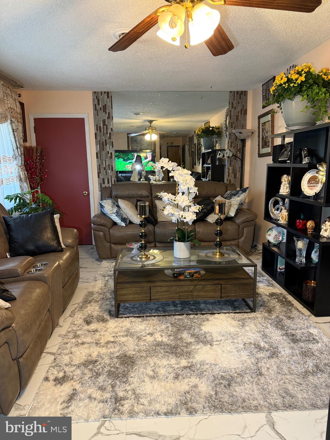 1339 Monmouth Road Mount Holly, NJ 08060 - Photo 10 of 34 a living room with furniture and a fireplace