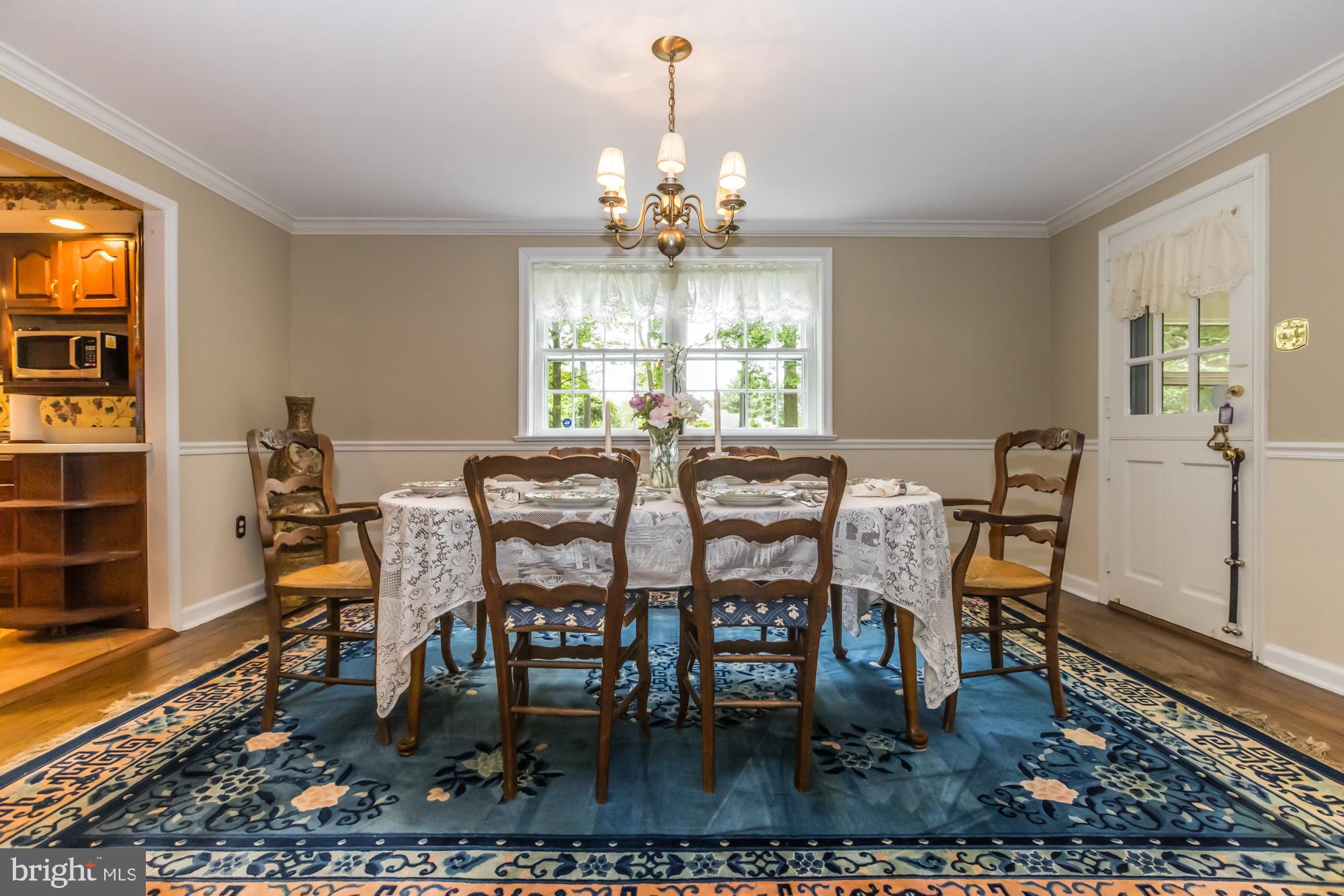 505 Woodhaven Road West Chester, PA 19382 - Photo 5 of 57 Formal Dining Room w/Entry to screened porch