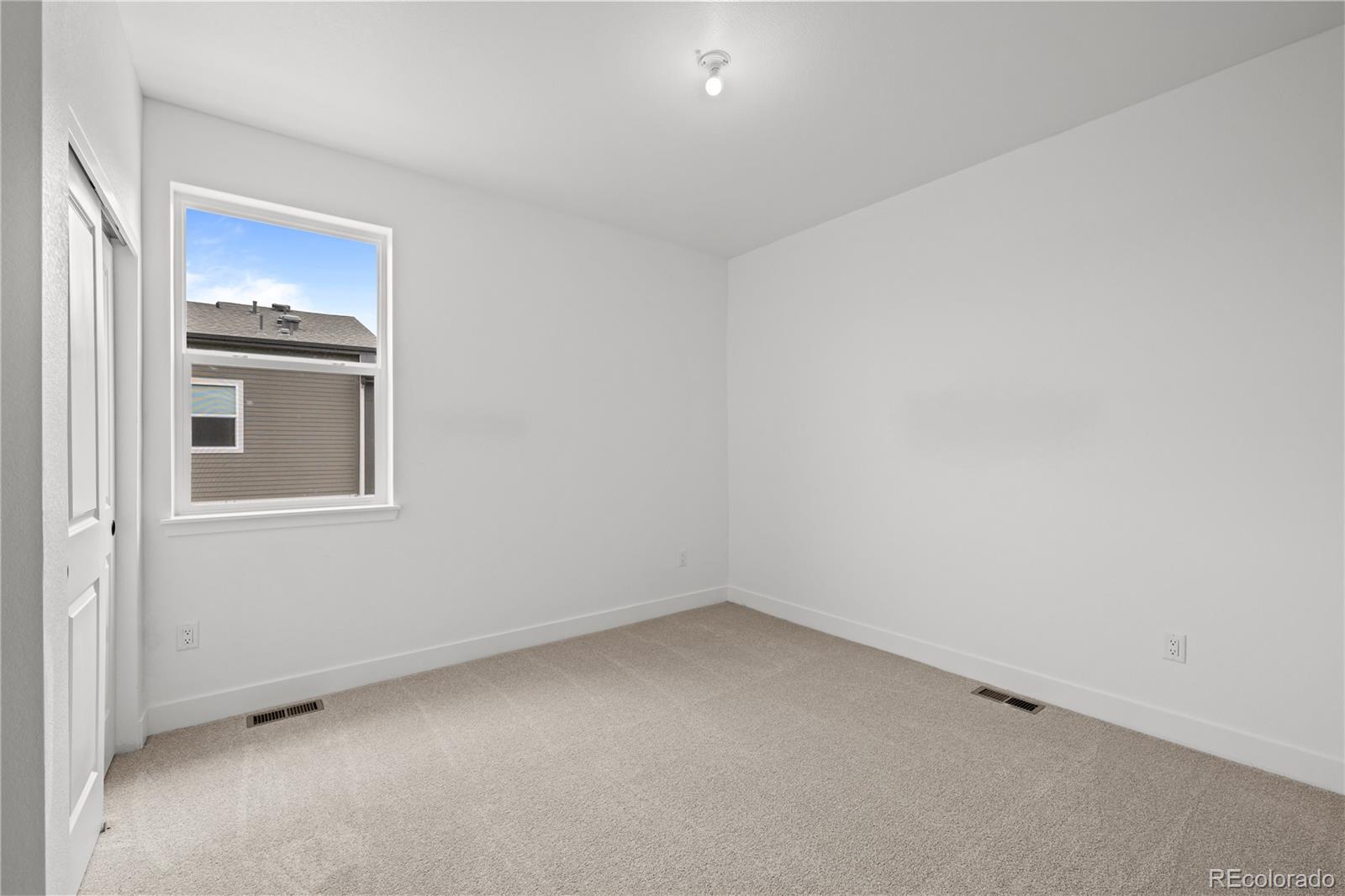 2736 West 68th Avenue Denver, CO 80221 - Photo 30 of 44 a view of an empty room