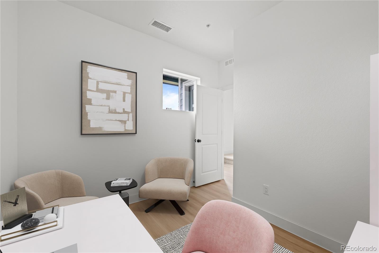 2736 West 68th Avenue Denver, CO 80221 - Photo 5 of 44 a living room with furniture and a window