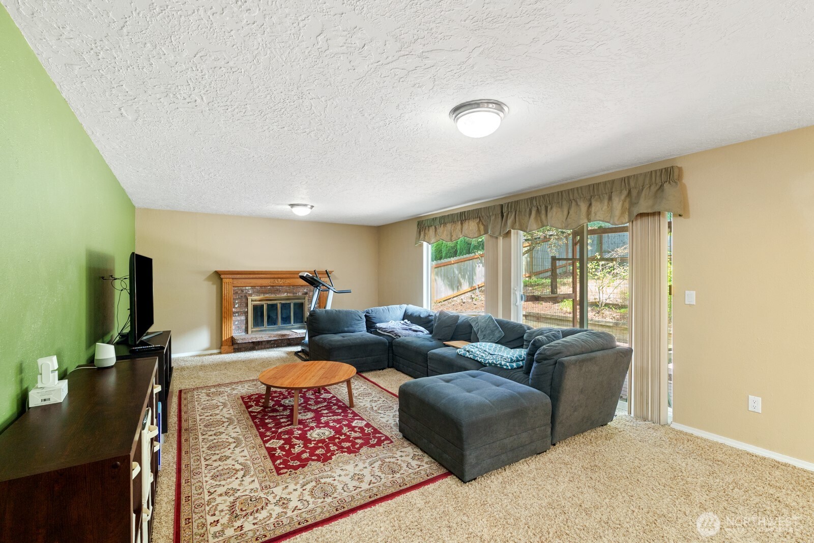 32738 6th Avenue Southwest Federal Way, WA 98023 - Photo 14 of 40 a living room with furniture and a flat screen tv