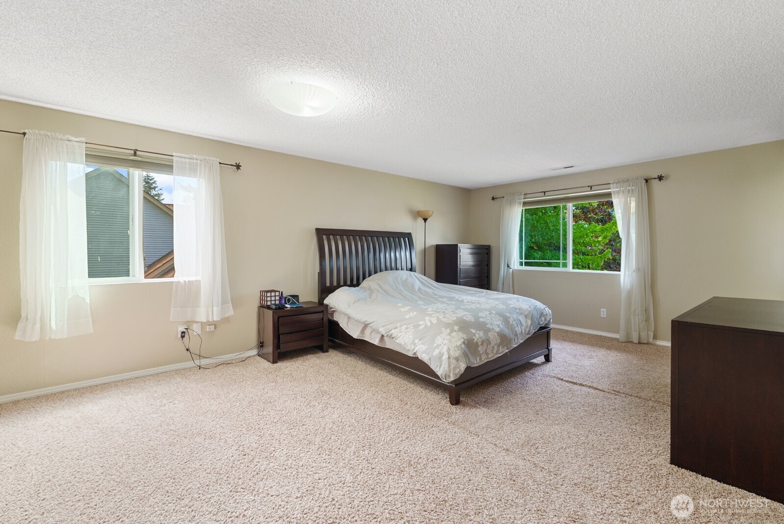 32738 6th Avenue Southwest Federal Way, WA 98023 - Photo 21 of 40 a bedroom with a bed and a window