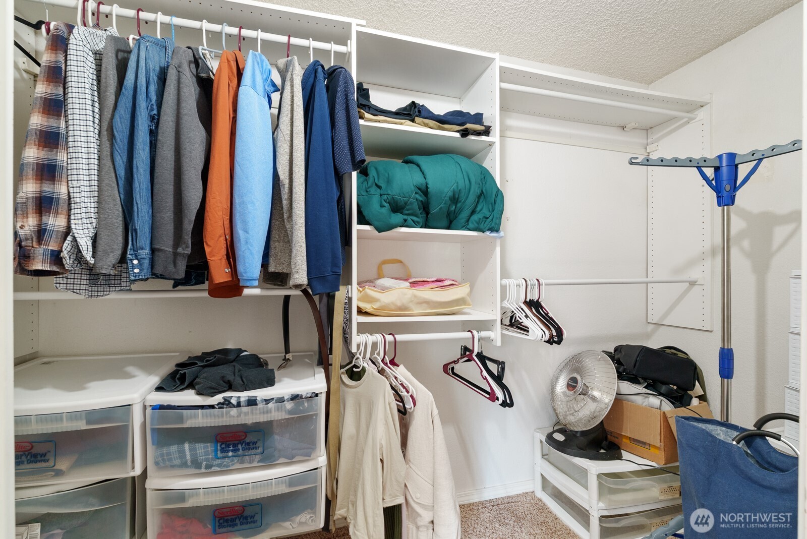 32738 6th Avenue Southwest Federal Way, WA 98023 - Photo 25 of 40 a view of walk in closet with clothes and shoes