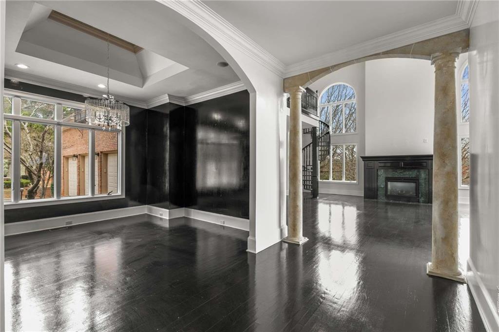 1483 Jones Road Roswell, GA 30075 - Photo 23 of 37 a view of interior space with wooden floor and windows